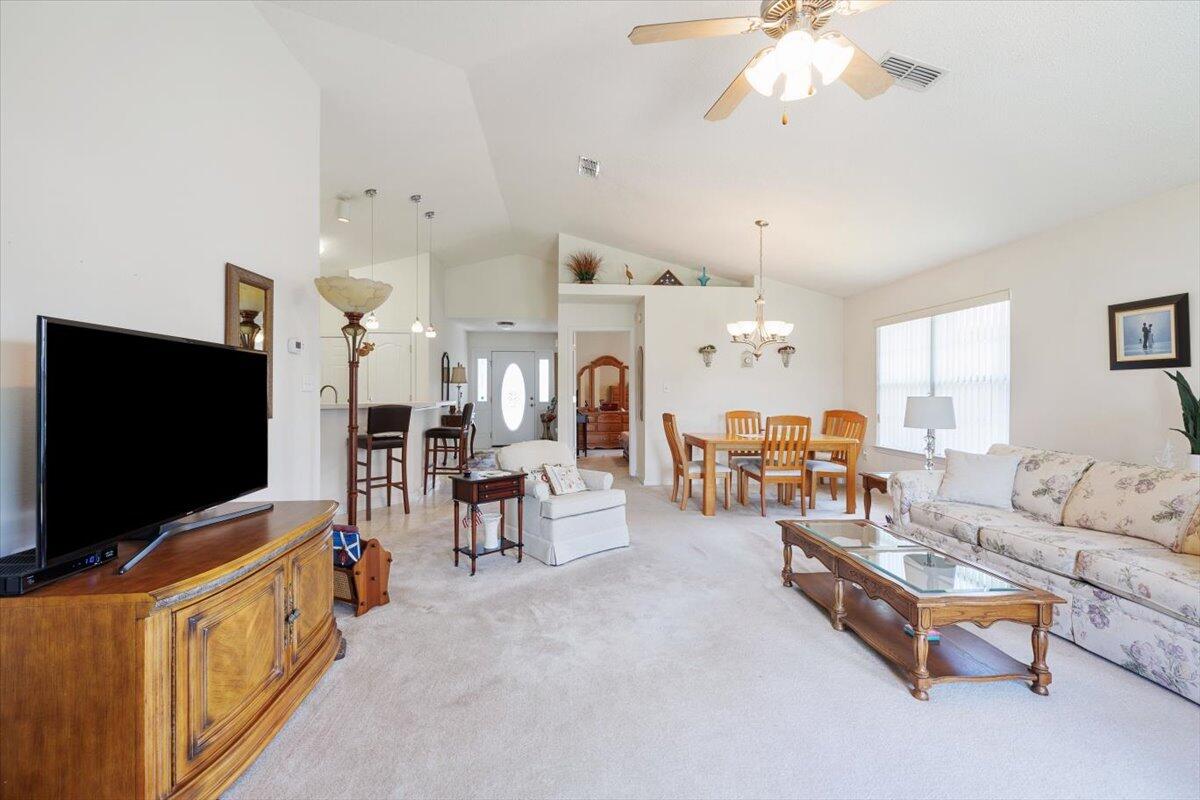 223 Sandy Cay Drive Miramar Beach, FL 32550 - Photo 11 of 25 a living room with furniture and a flat screen tv