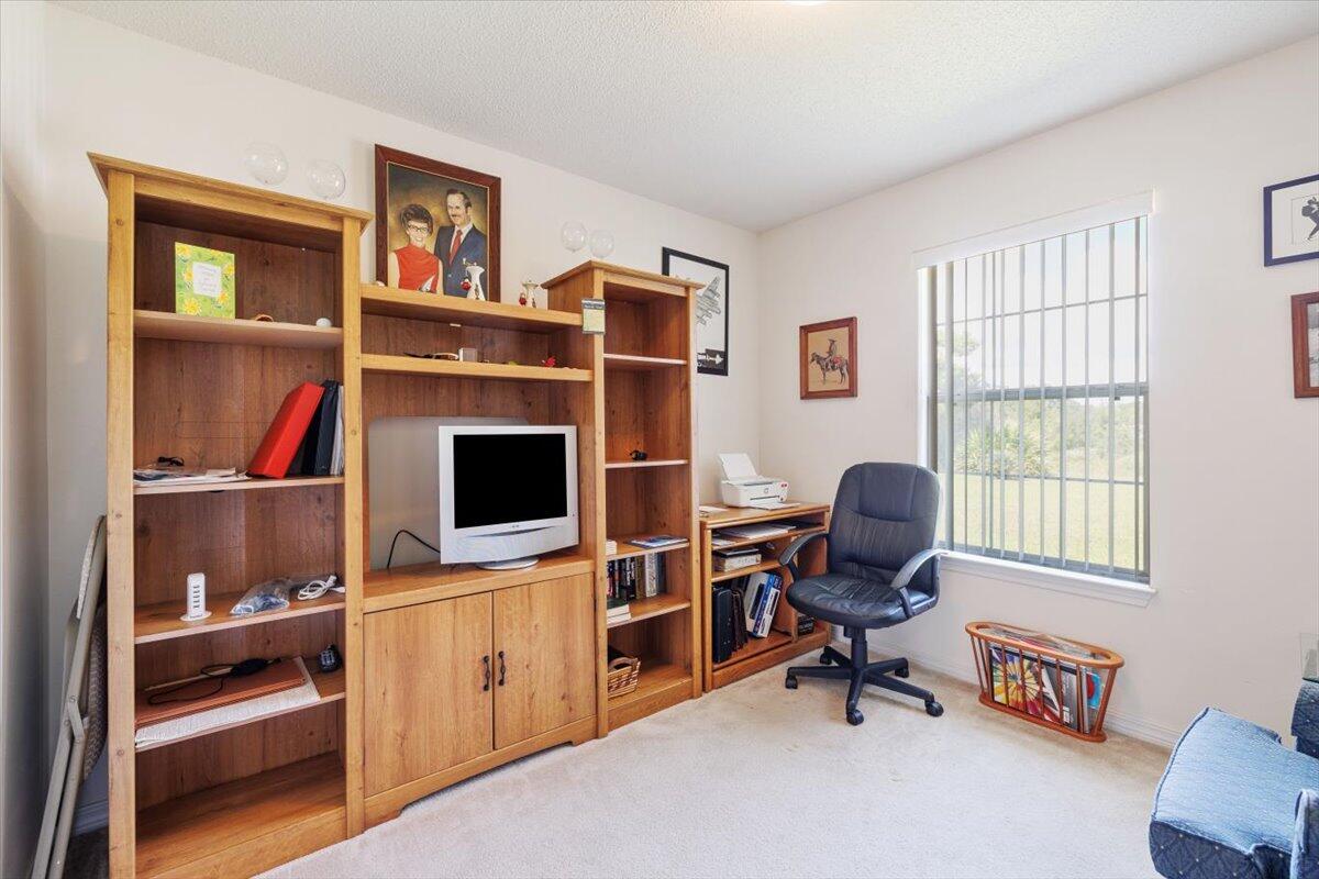 223 Sandy Cay Drive Miramar Beach, FL 32550 - Photo 17 of 25 a view of a workspace with furniture and a window