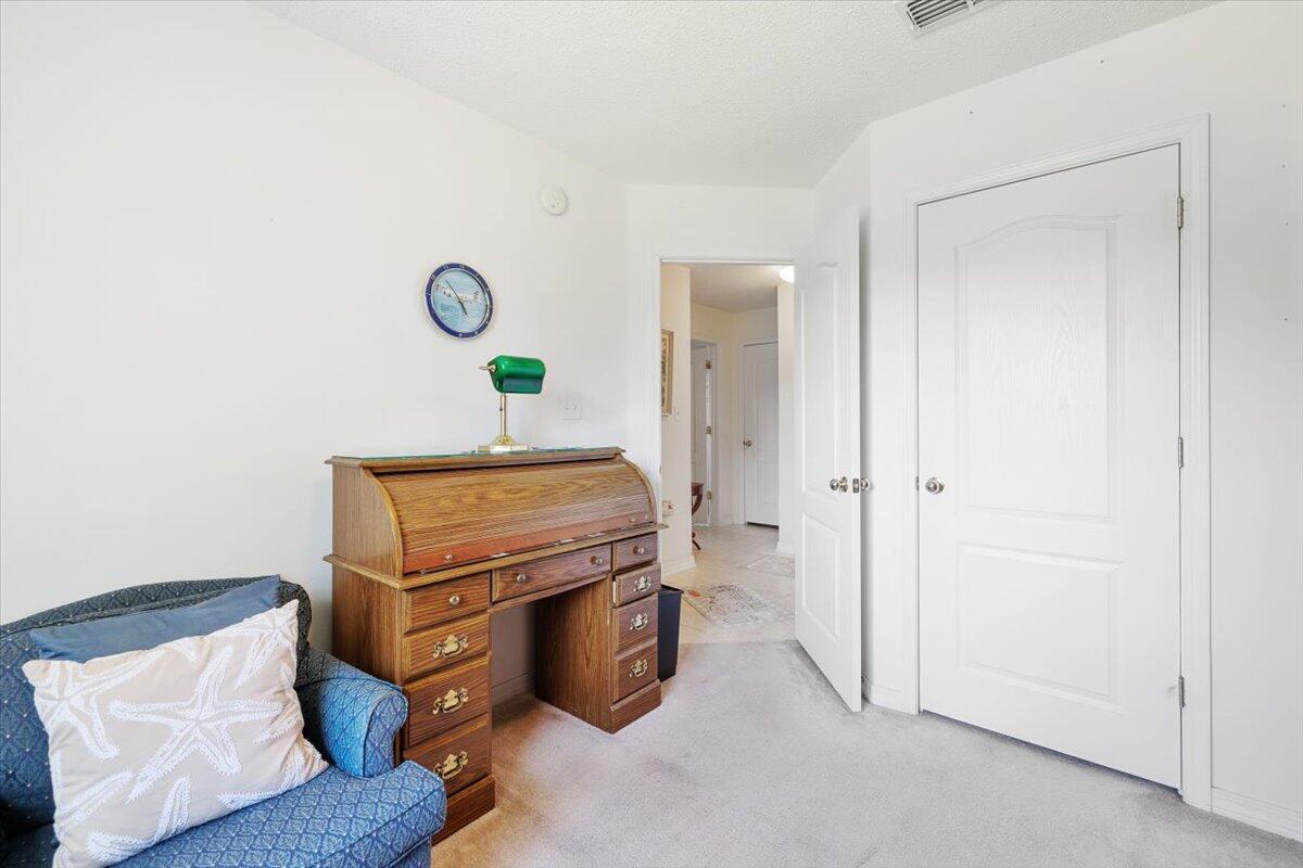 223 Sandy Cay Drive Miramar Beach, FL 32550 - Photo 18 of 25 a living room with a bed and a table