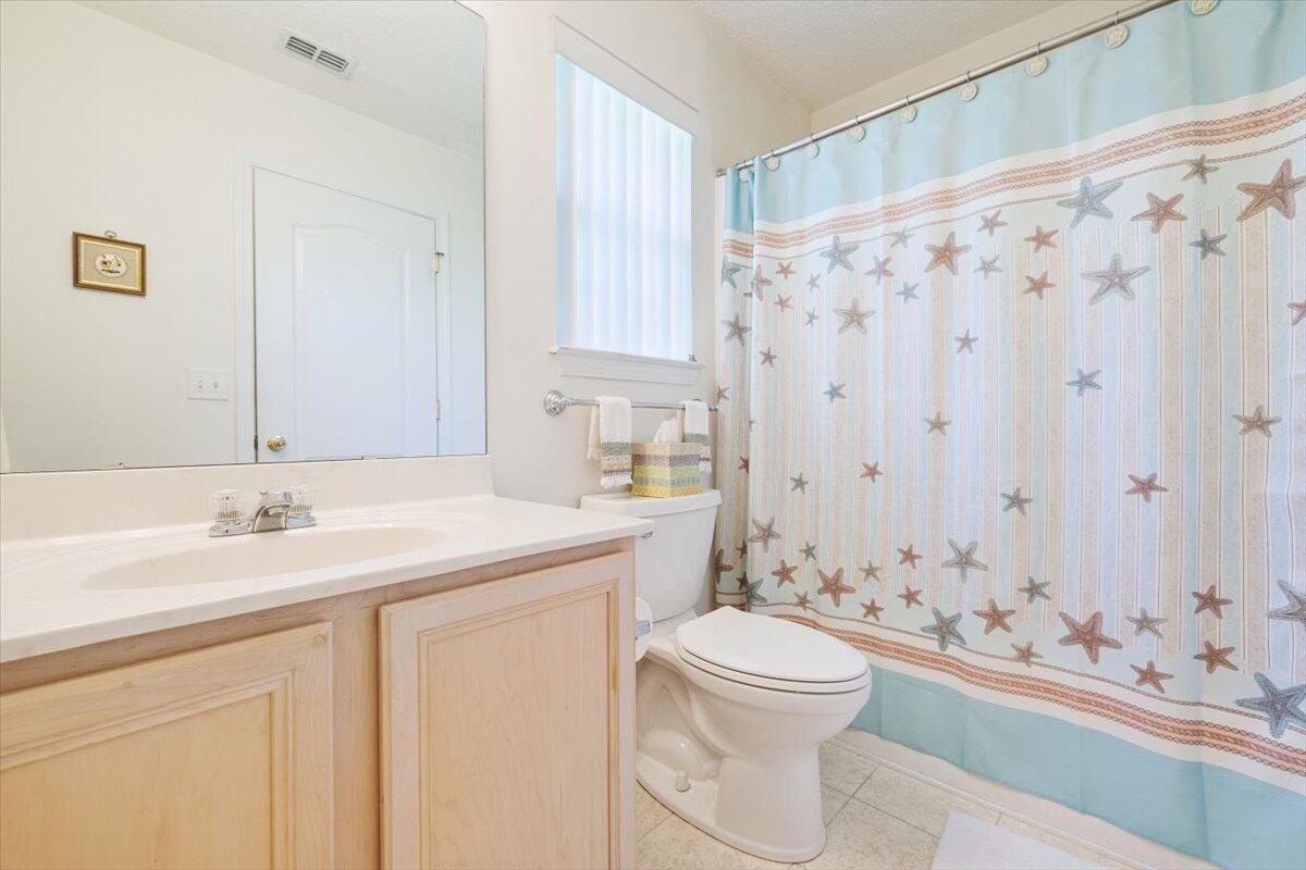 223 Sandy Cay Drive Miramar Beach, FL 32550 - Photo 20 of 25 a bathroom with a sink a toilet and shower