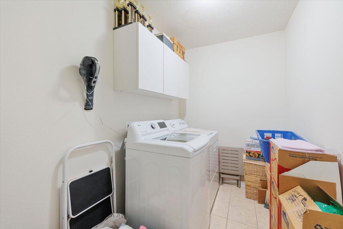 223 Sandy Cay Drive Miramar Beach, FL 32550 - Photo 21 of 25 a utility room with dryer and washer