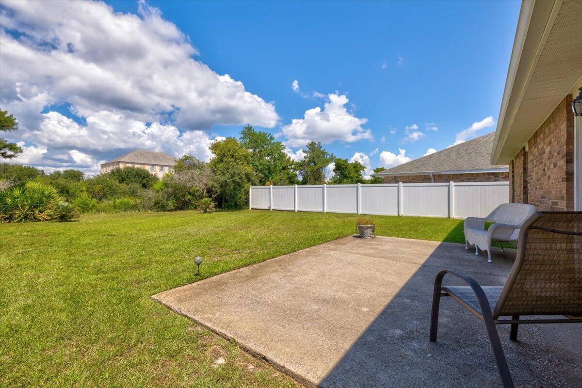 223 Sandy Cay Drive Miramar Beach, FL 32550 - Photo 22 of 25 a view of yard with swimming pool and green space
