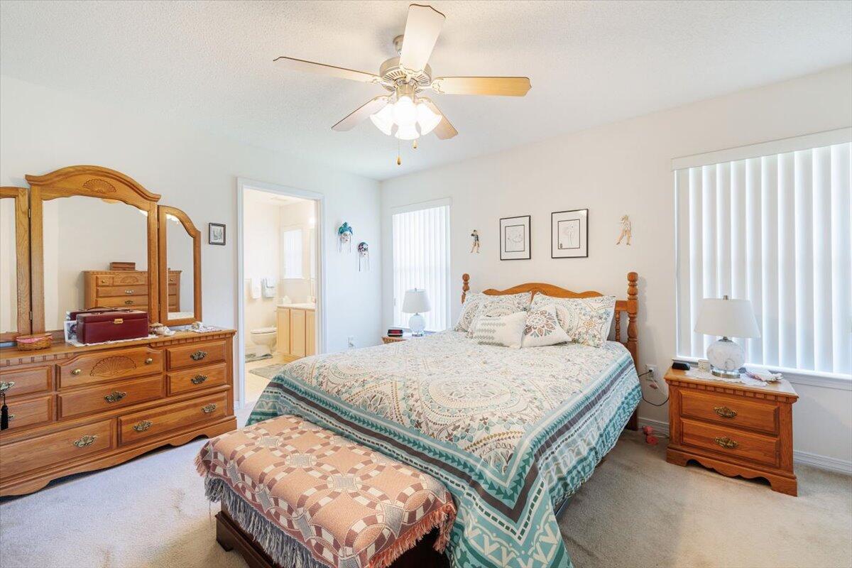 223 Sandy Cay Drive Miramar Beach, FL 32550 - Photo 3 of 25 a bedroom with a bed and a dresser