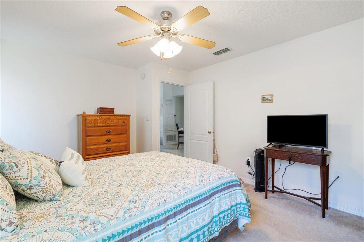 223 Sandy Cay Drive Miramar Beach, FL 32550 - Photo 4 of 25 a bedroom with a bed and a flat screen tv