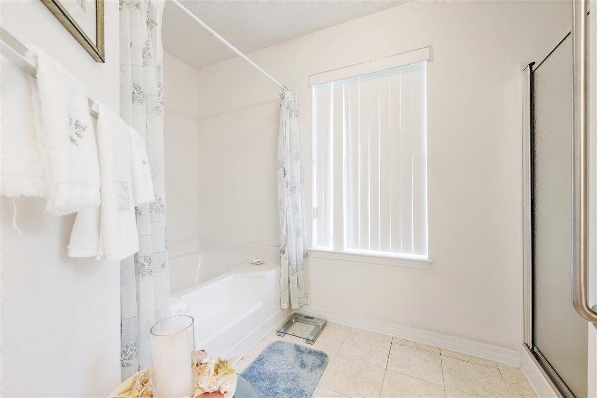 223 Sandy Cay Drive Miramar Beach, FL 32550 - Photo 6 of 25 a bathroom with a bathtub and shower