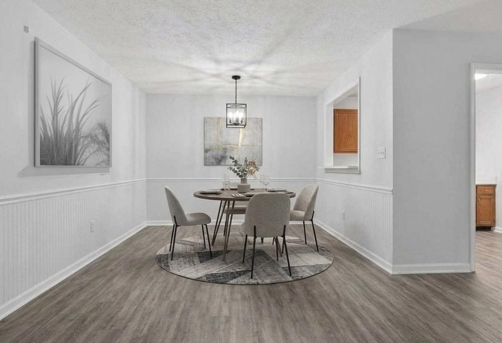 2281 Hunter's Run Drive, Unit 2281 Reston, VA 20191 - Photo 15 of 25 Virtually Staged Dining Room