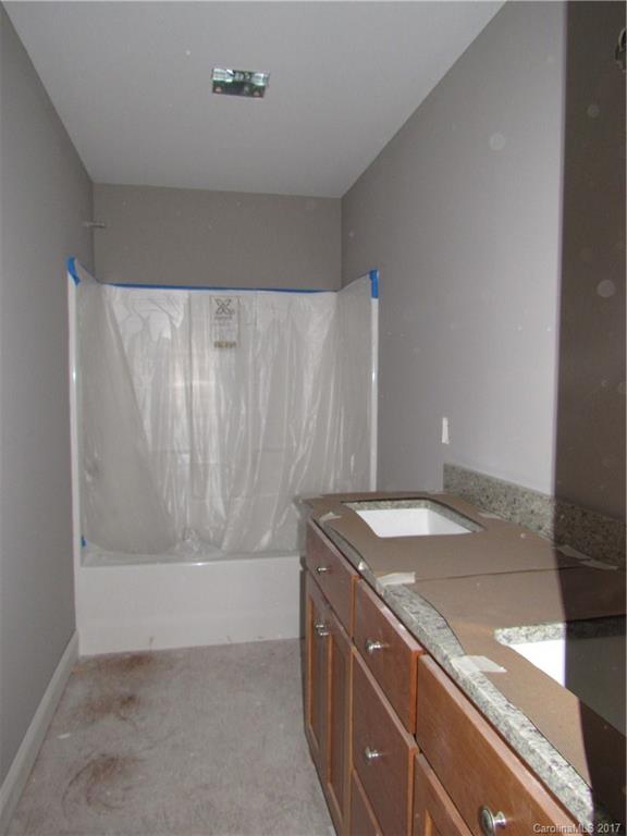 361 Springlake Road York, SC 29745 - Photo 6 of 10 a bathroom with a granite countertop sink and a mirror