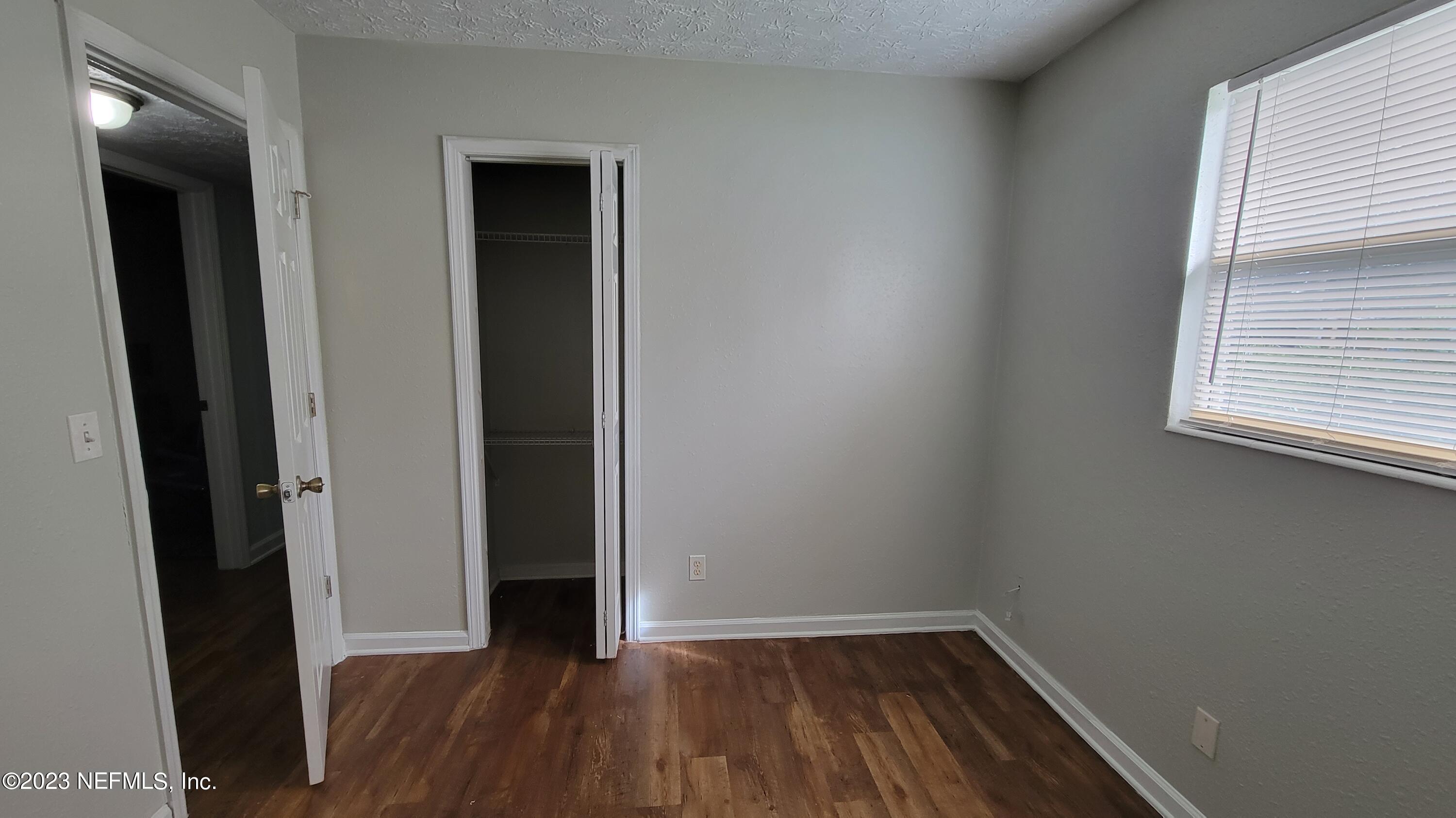 11685 Shellfish Drive Jacksonville, FL 32246 - Photo 19 of 32 wooden floor in an empty room