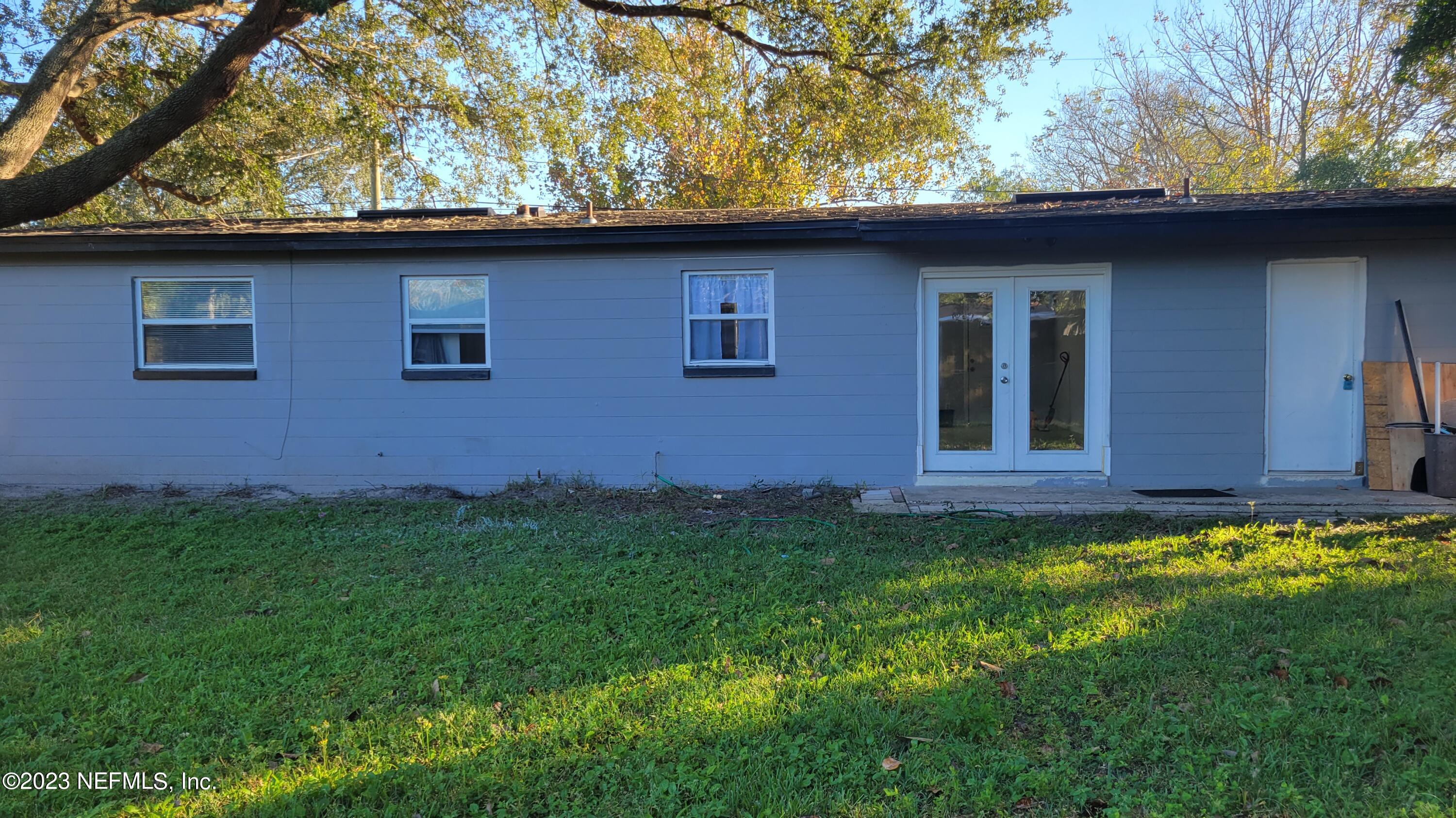 11685 Shellfish Drive Jacksonville, FL 32246 - Photo 32 of 32 a view of a house with a yard