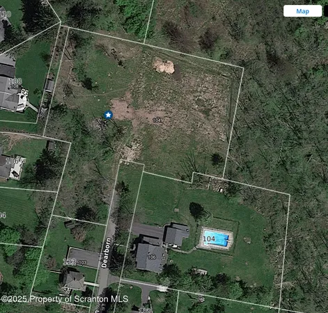 a view of a bathroom with a shower and sink