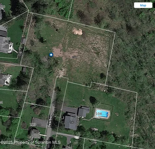 a view of a bathroom with a shower and sink