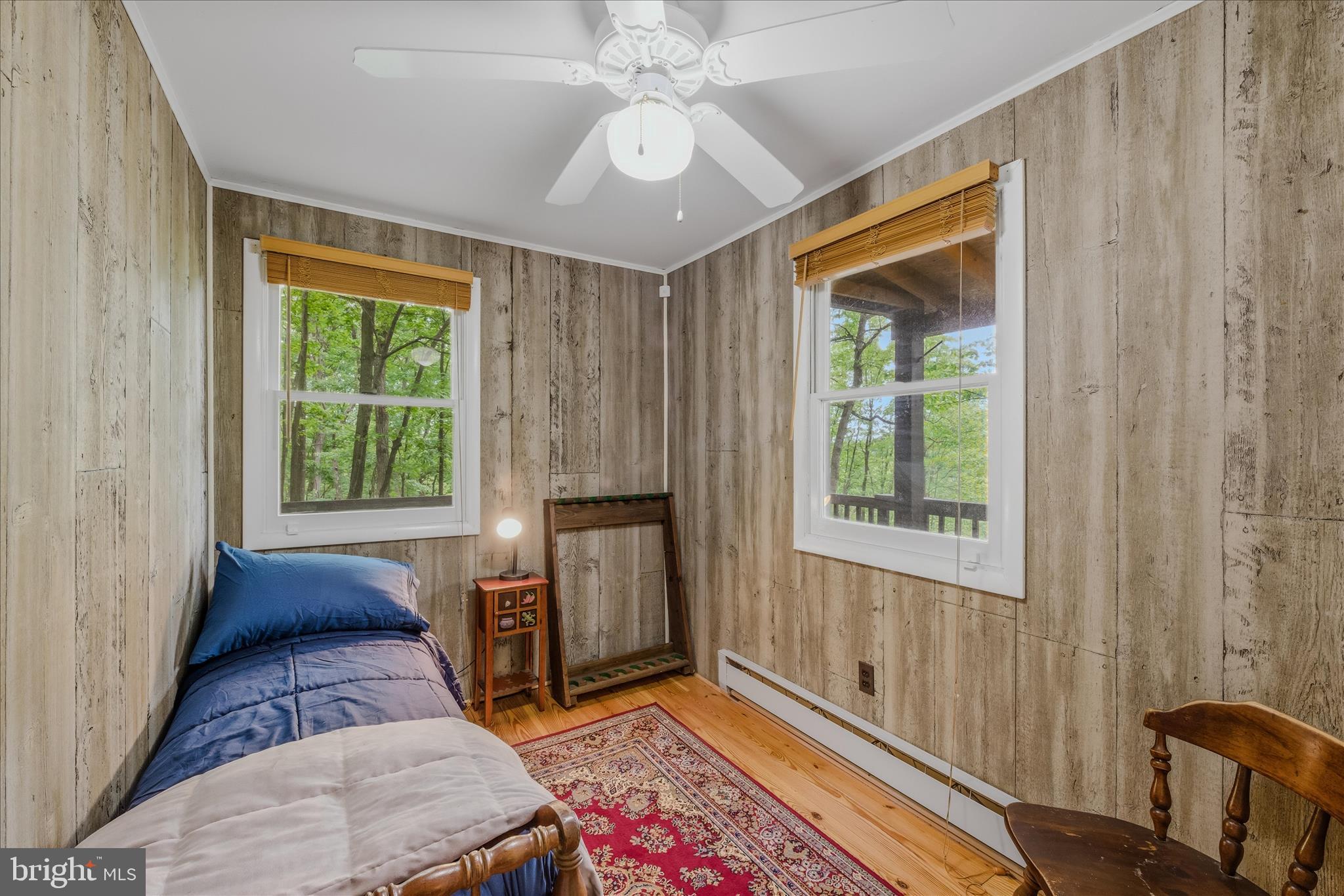 98 Ore Trail Berkeley Springs, WV 25411 - Photo 25 of 46 a living room with a bed furniture and a window
