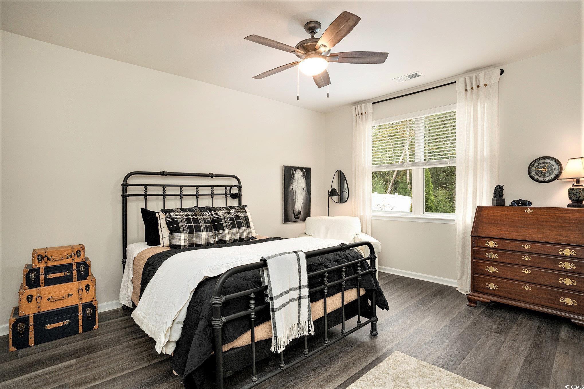 132 Columbus Street Conway, SC 29526 - Photo 20 of 39 Bedroom featuring dark wood-type flooring and a ceiling fan