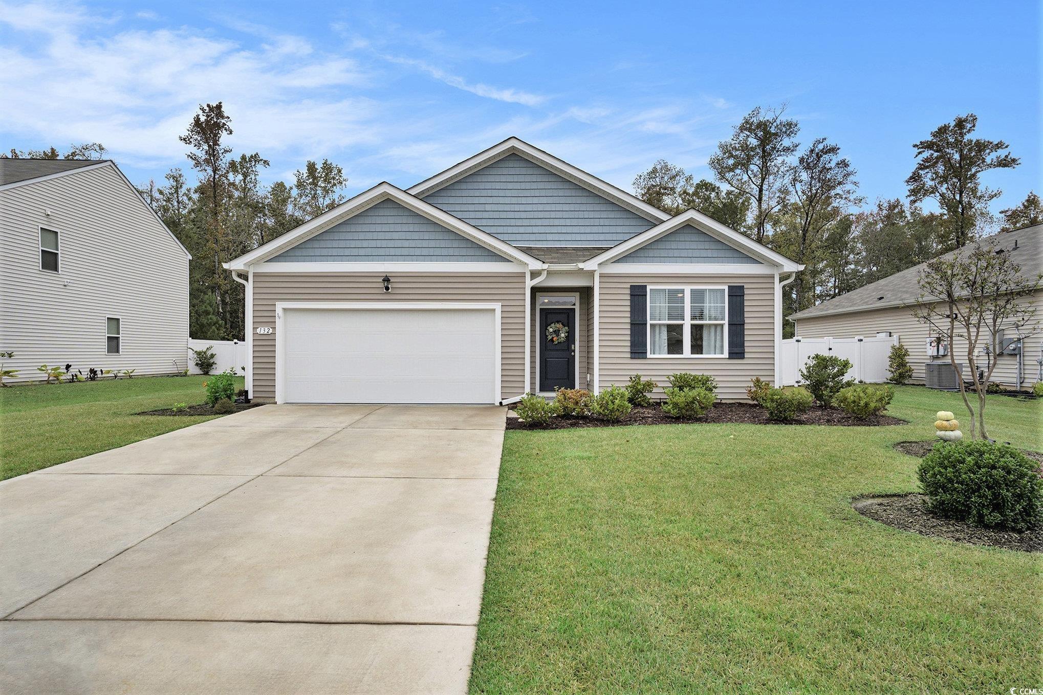 132 Columbus Street Conway, SC 29526 - Photo 2 of 39 View of front of property with concrete driveway and a garage