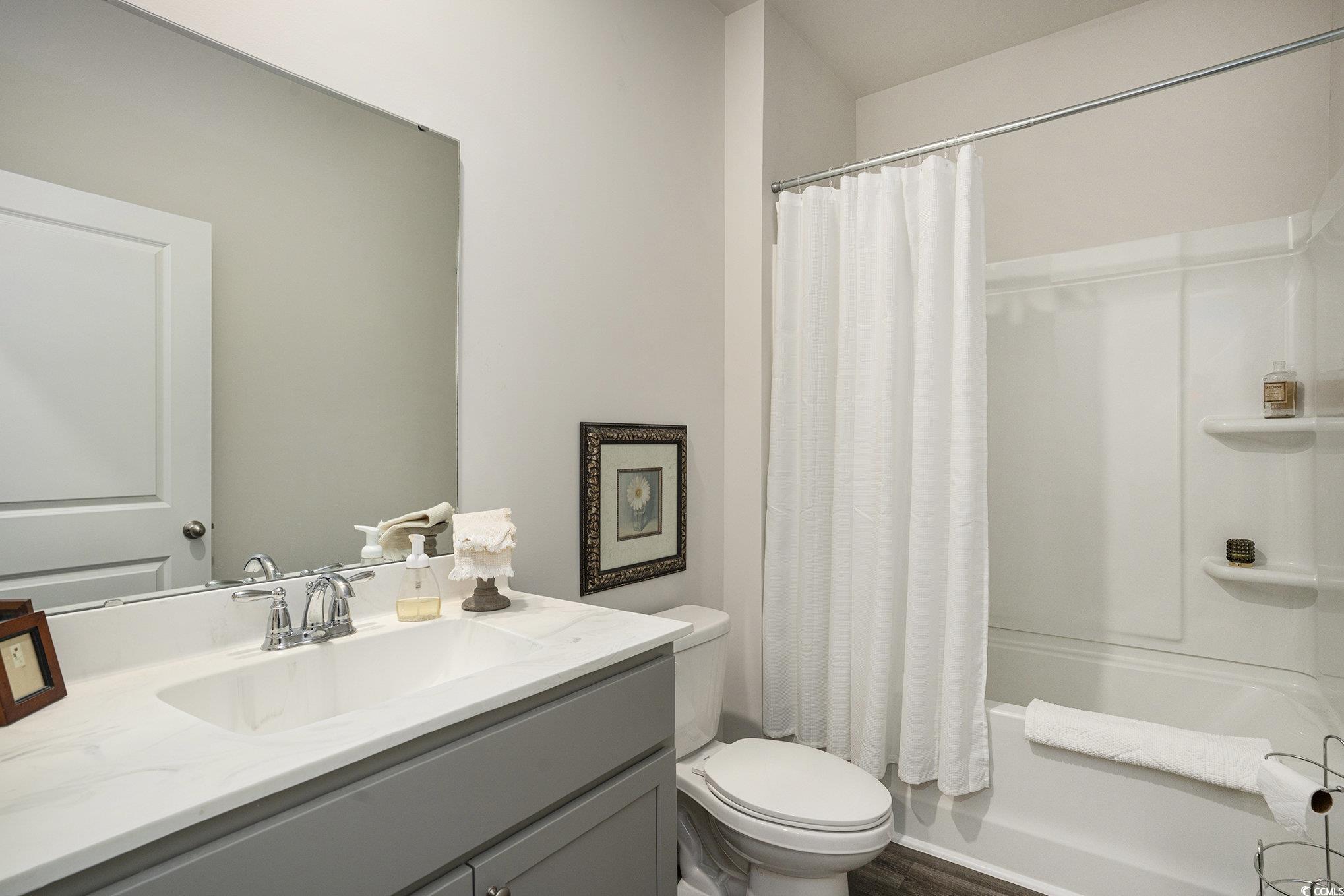 132 Columbus Street Conway, SC 29526 - Photo 27 of 39 Carpeted bedroom featuring a ceiling fan