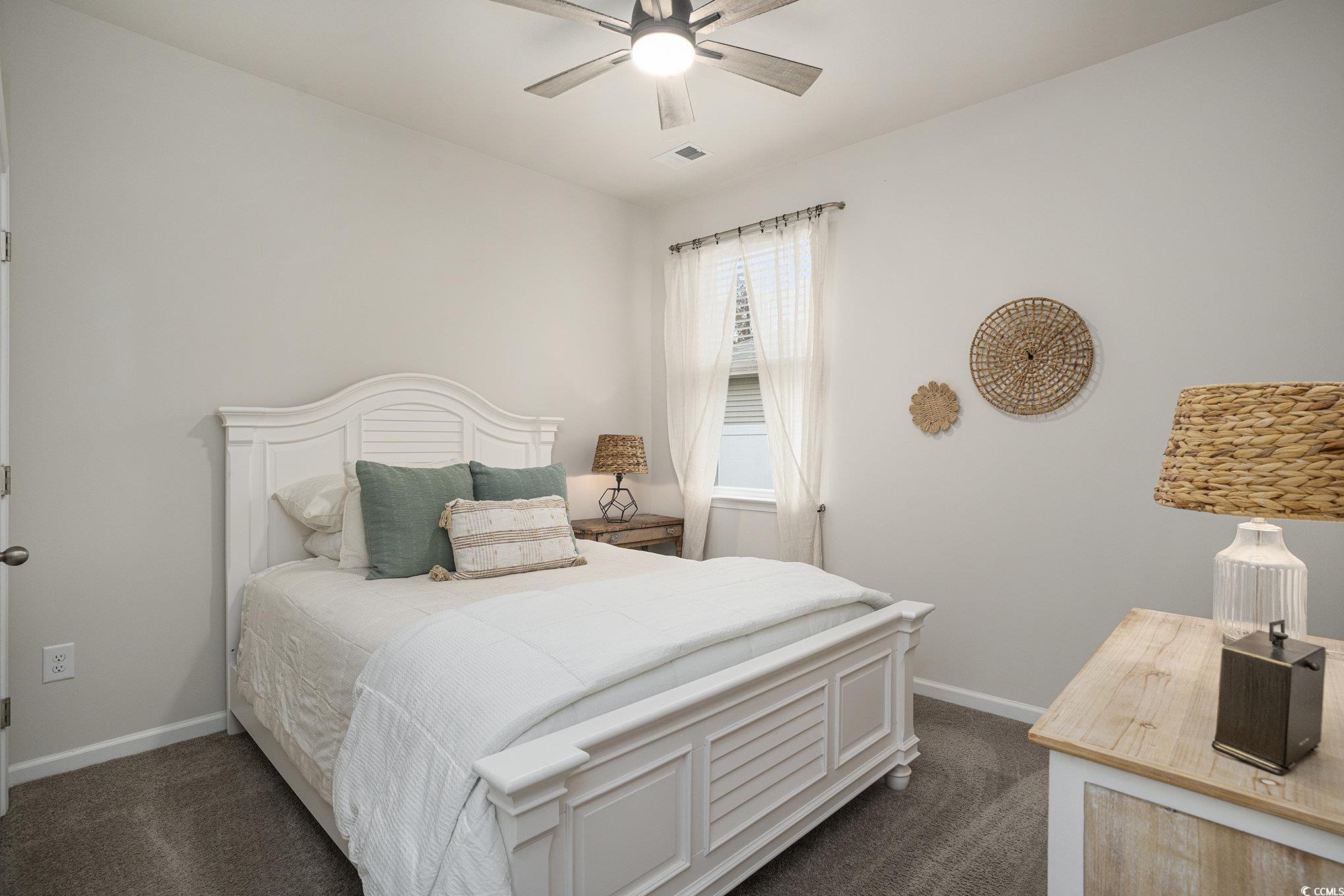 132 Columbus Street Conway, SC 29526 - Photo 28 of 39 Bathroom featuring shower / bathtub combination with curtain and vanity