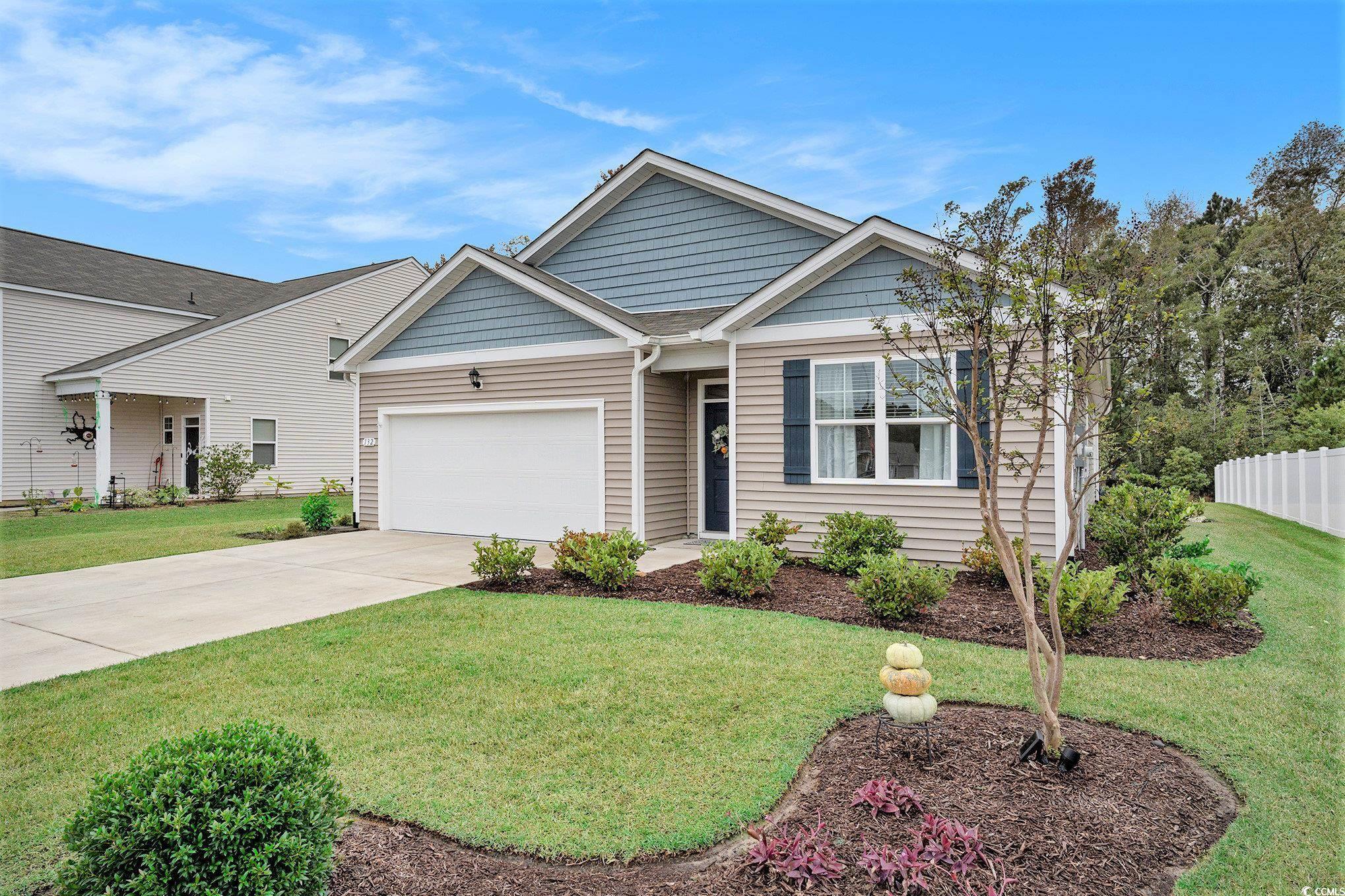132 Columbus Street Conway, SC 29526 - Photo 3 of 39 View of front of house with driveway and an attached garage