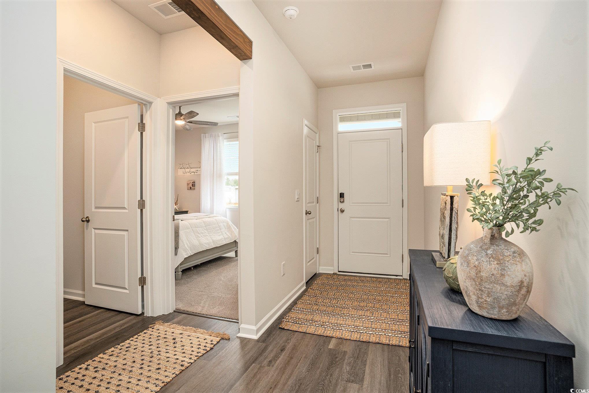 132 Columbus Street Conway, SC 29526 - Photo 4 of 39 Entryway with dark wood-style flooring and ceiling fan