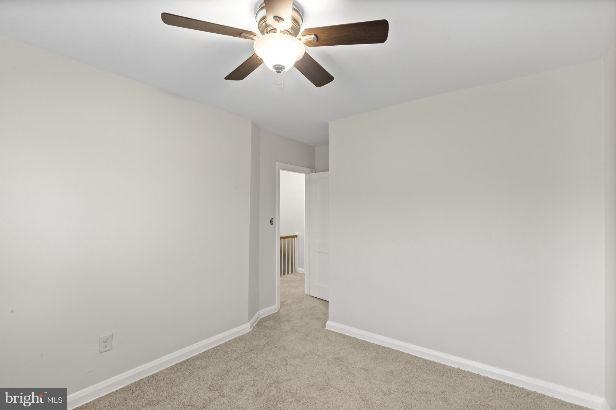 8343 Ridgely Oak Road Parkville, MD 21234 - Photo 20 of 31 an empty room with a fan and a fan