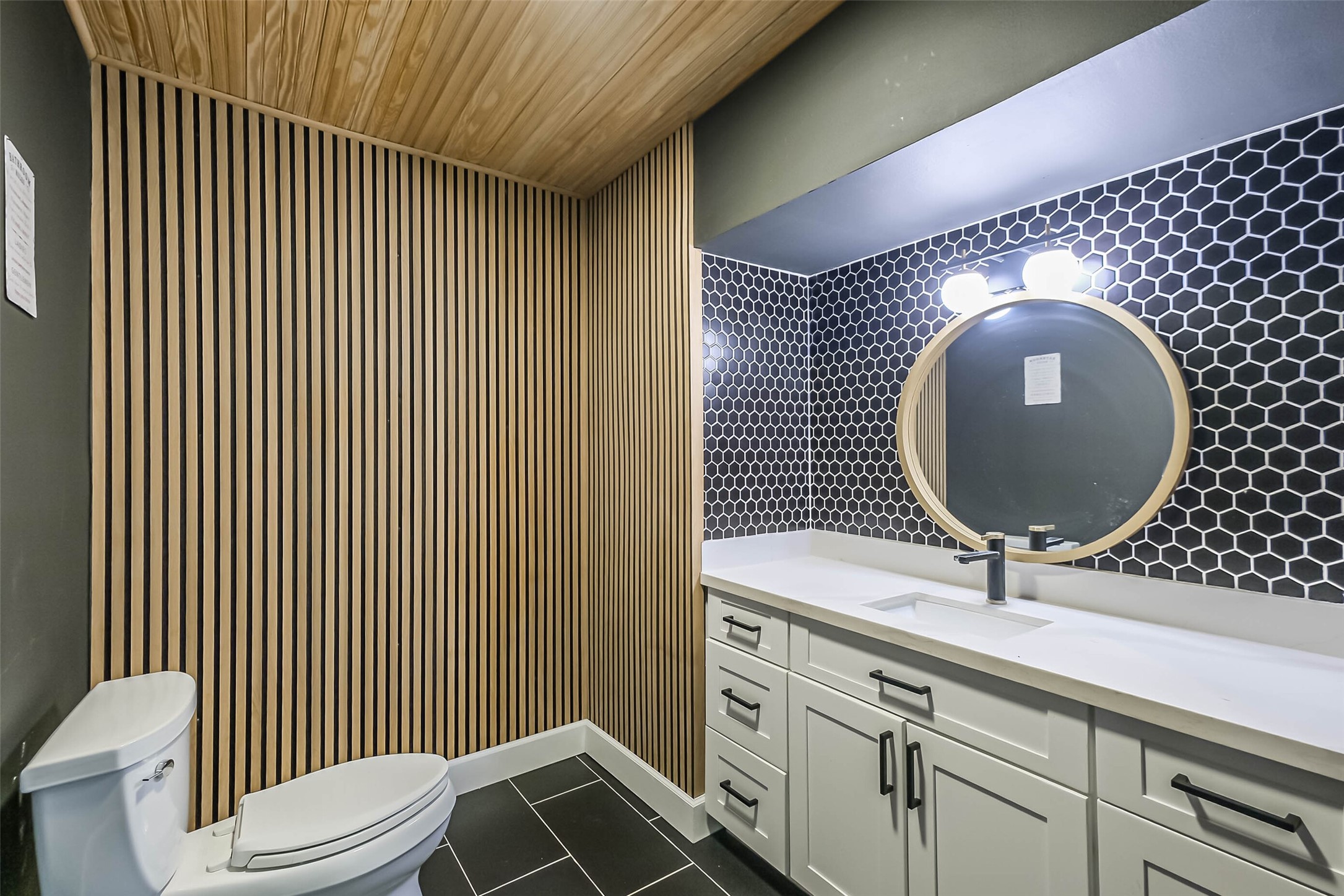 11019 Clodine Road Sugar Land, TX 77498 - Photo 24 of 39 a bathroom with a toilet a sink and mirror