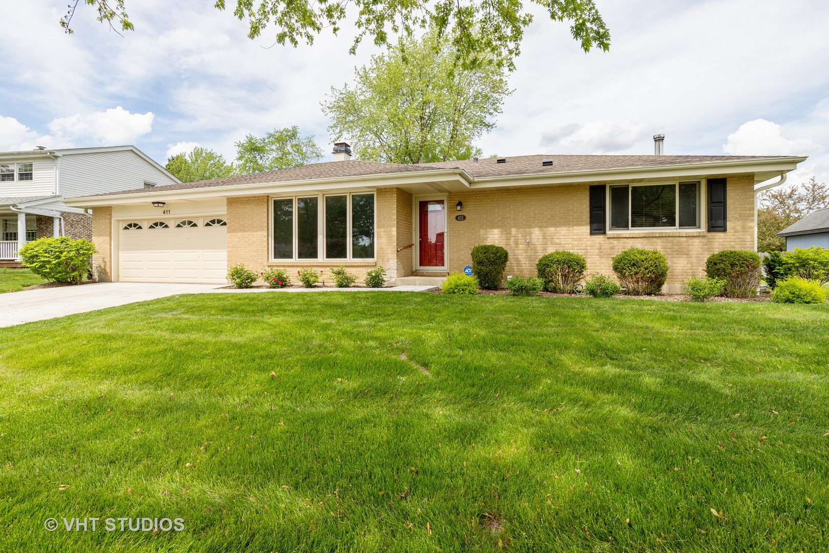 411 Beck Road Lindenhurst, IL 60046 - Photo 1 of 18 a view of a yard in front of a house