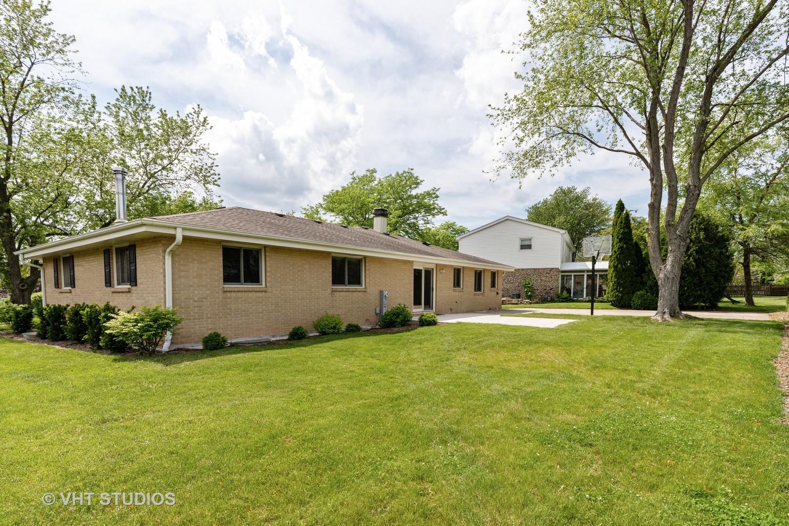 411 Beck Road Lindenhurst, IL 60046 - Photo 17 of 18 a front view of house with yard and trees