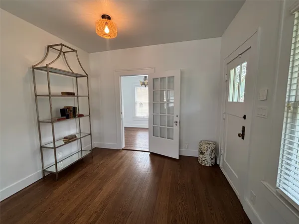 a view of a livingroom with wooden floor