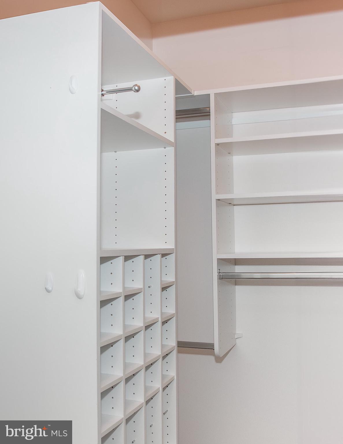 1622 Hardwick Court, Unit 202 Hanover, MD 21076 - Photo 18 of 25 a view of walk in closet with empty racks