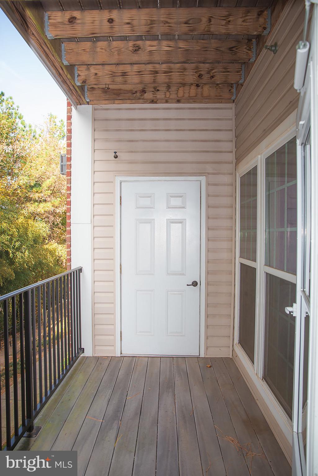 1622 Hardwick Court, Unit 202 Hanover, MD 21076 - Photo 23 of 25 a view of a brick house with wooden floor