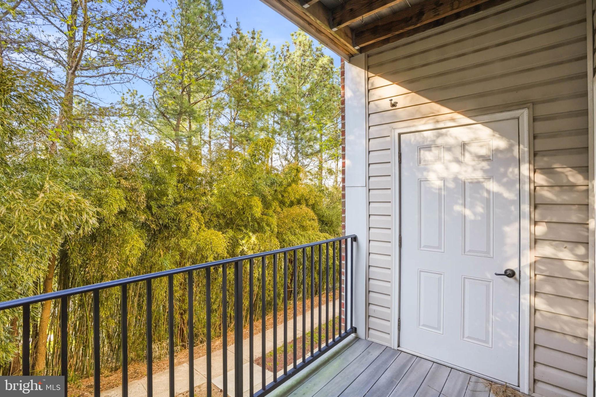 1622 Hardwick Court, Unit 202 Hanover, MD 21076 - Photo 33 of 60 Serene balcony with lush greenery.