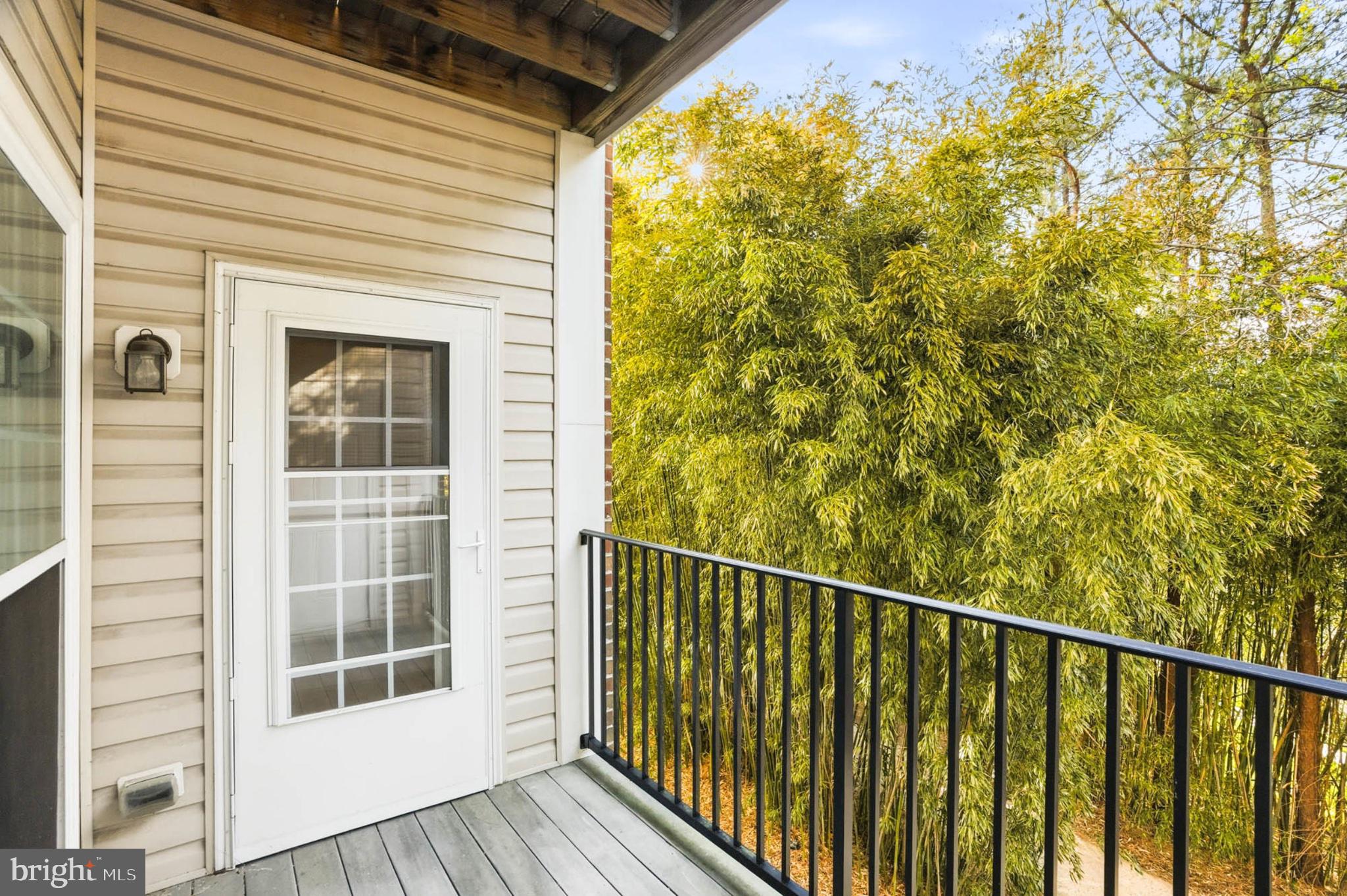 1622 Hardwick Court, Unit 202 Hanover, MD 21076 - Photo 34 of 60 Serene balcony with lush greenery.