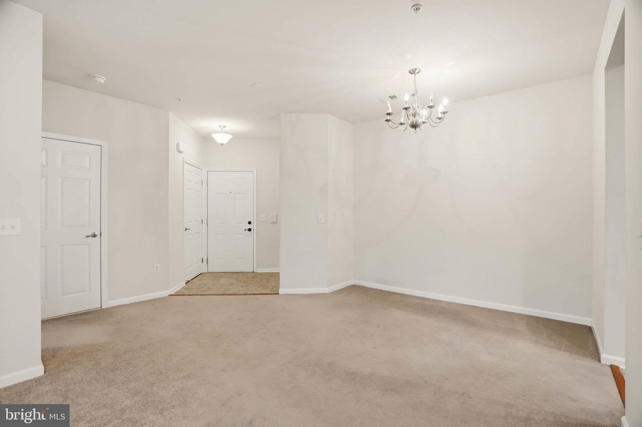 1622 Hardwick Court, Unit 202 Hanover, MD 21076 - Photo 5 of 60 Spacious entryway with elegant lighting.