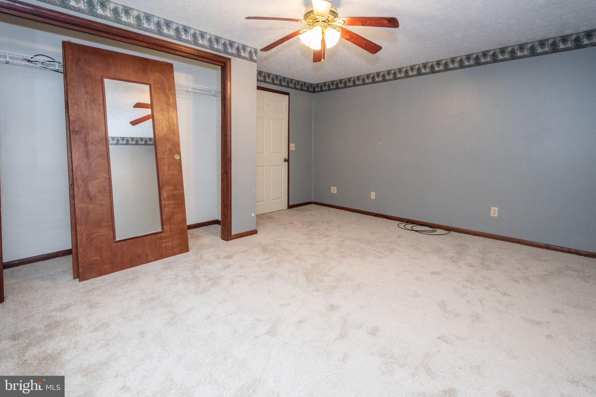 2165 Jennings Road Jennings, MD 21536 - Photo 18 of 23 Spacious room with cozy ambiance.