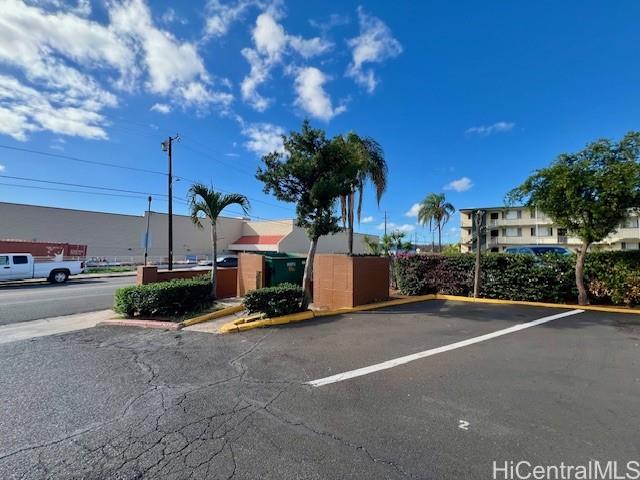 94-054 Leolua Street, Unit C114 Waipahu, HI 96797 - Photo 12 of 18 a view of street with parked cars