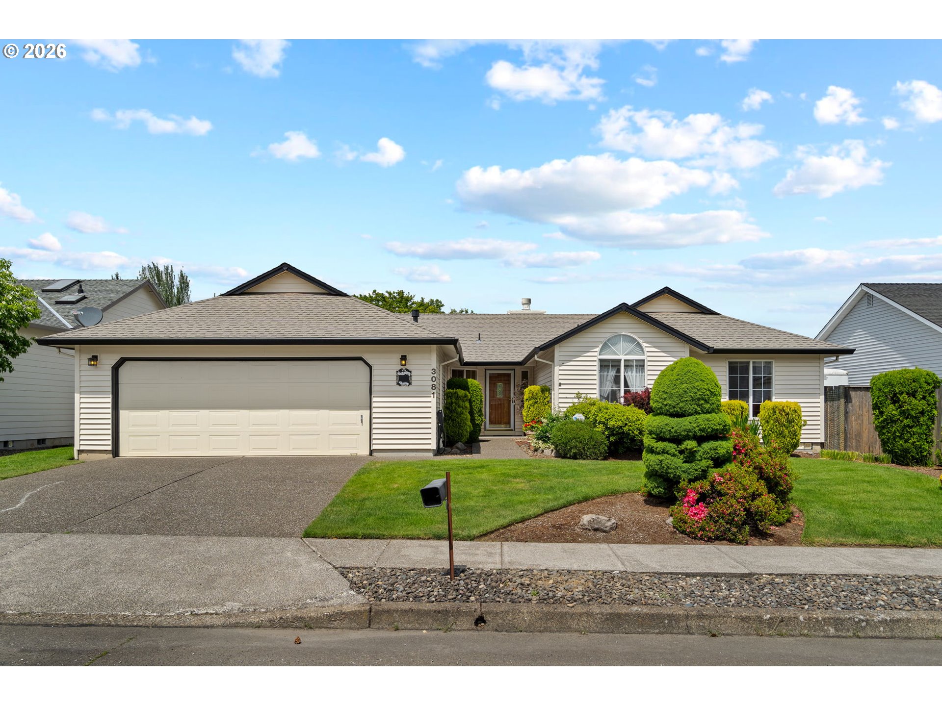 3081 Southwest 31st Street Gresham, OR 97080 - Photo 2 of 38 a house view with a garden space