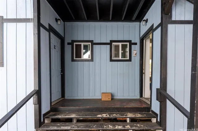a view of a kitchen cabinets and wooden floor