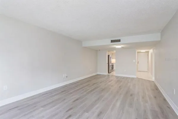 a front view of a building with garden