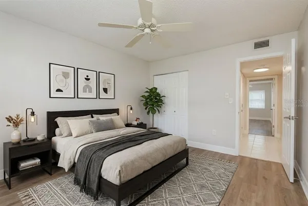 a view of a swimming pool with a bench