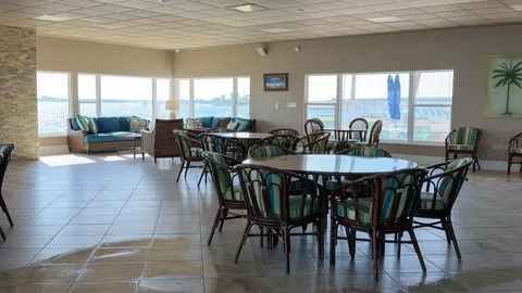 a view of a wooden floor with a lake view