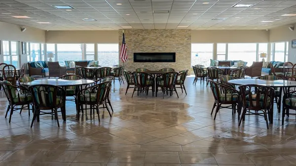 a view of a balcony with chairs