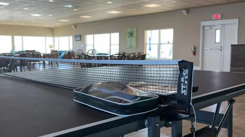 a view of a balcony with chairs