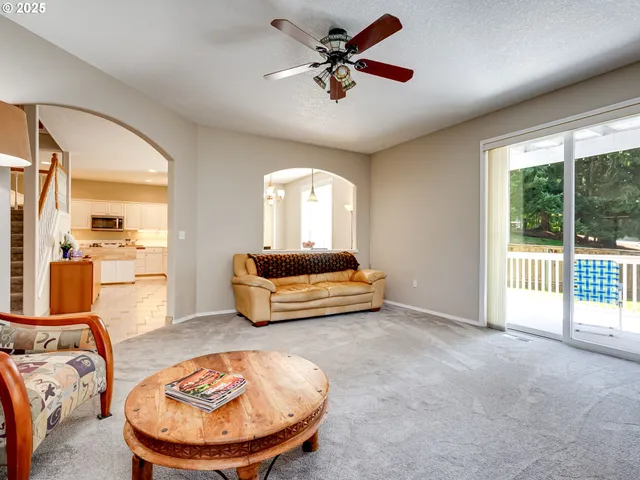 a view of a livingroom with furniture and a fireplace