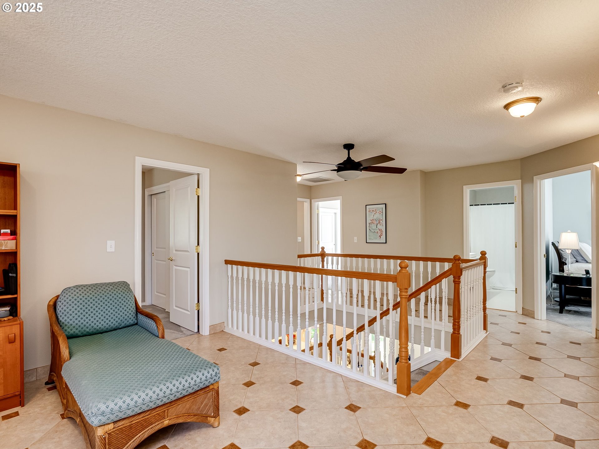 756 Sunset Ridge Drive Washougal, WA 98671 - Photo 23 of 47 a view of a hallway with windows and stairs