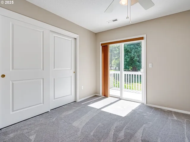 a view of a room with a large window