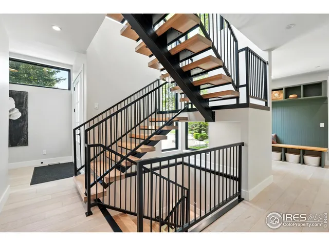 a view of entryway with wooden floor