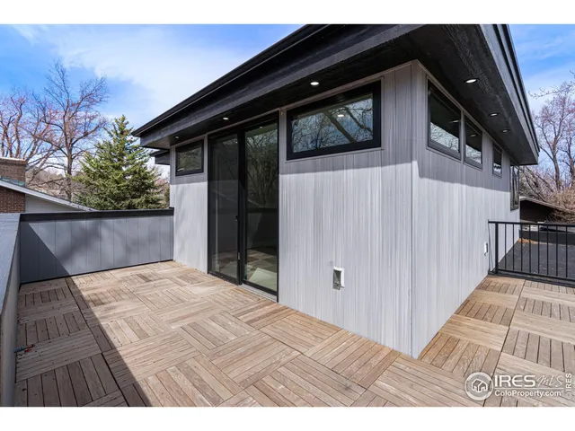 a bathroom with a sink a mirror and a shower