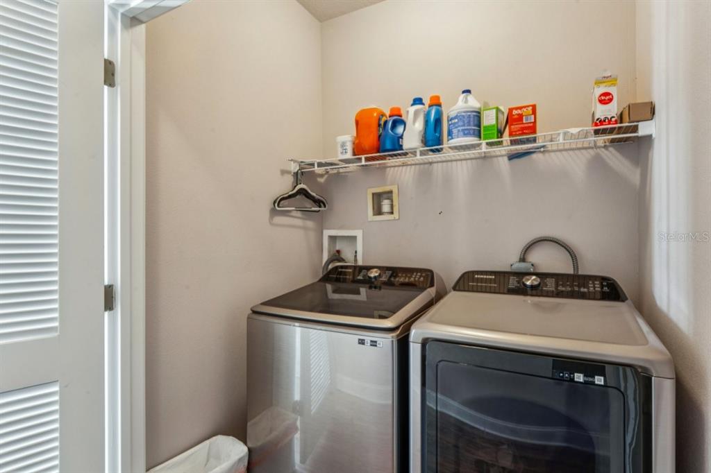 6319 Sunset Bay Circle Apollo Beach, FL 33572 - Photo 55 of 87 a utility room with sink dryer and washer