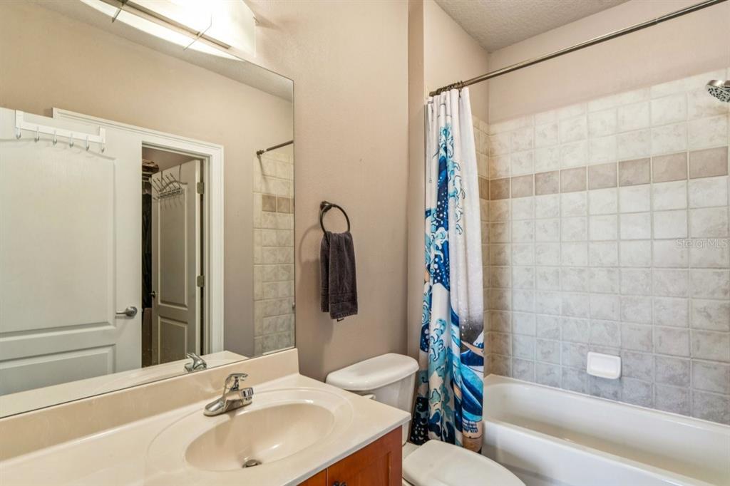 6319 Sunset Bay Circle Apollo Beach, FL 33572 - Photo 76 of 87 a bathroom with a sink and a mirror