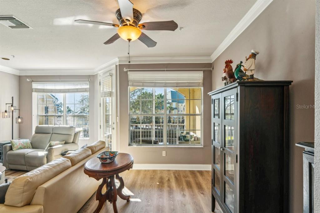 6319 Sunset Bay Circle Apollo Beach, FL 33572 - Photo 79 of 87 a living room with furniture and a large window