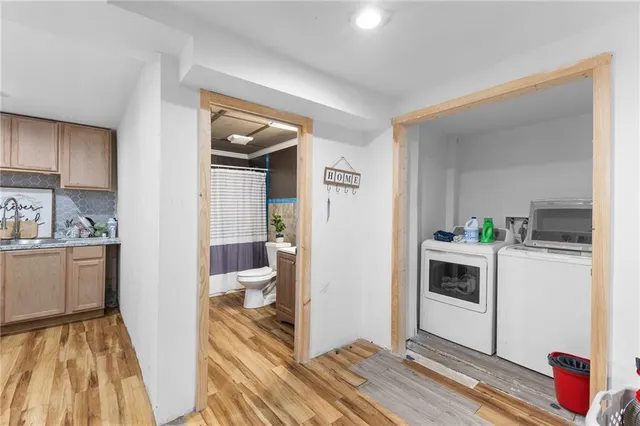 a kitchen with a refrigerator and stove